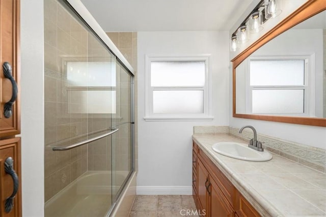 bathroom with vanity and tile patterned floors