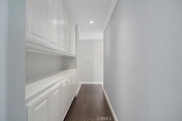 corridor featuring dark wood-type flooring