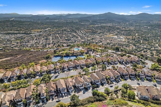 drone / aerial view featuring a mountain view