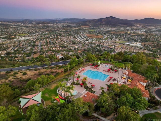 aerial view at dusk with a mountain view