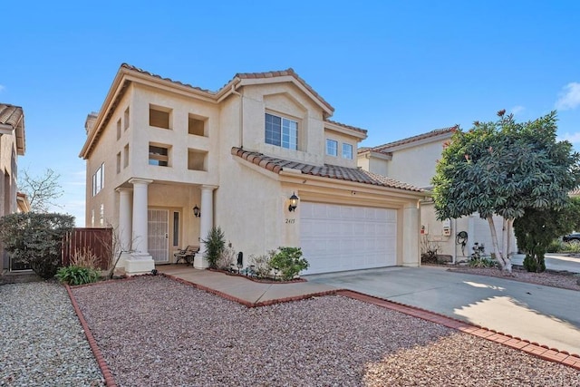 mediterranean / spanish-style home featuring a garage