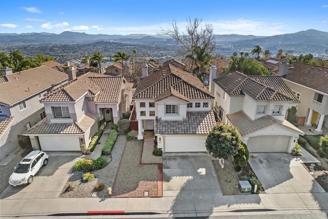 bird's eye view with a mountain view