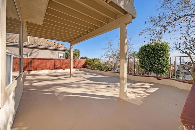 view of patio / terrace with fence