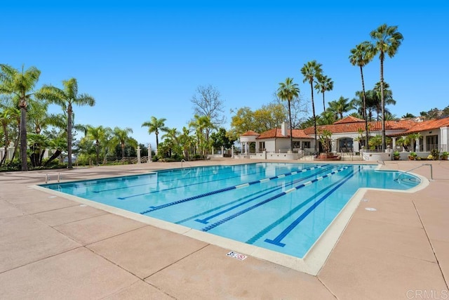 pool with a patio