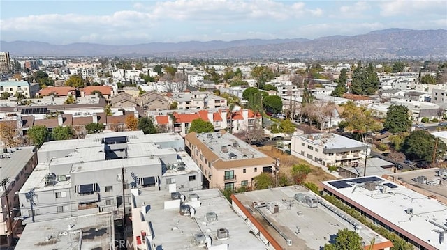 drone / aerial view featuring a mountain view