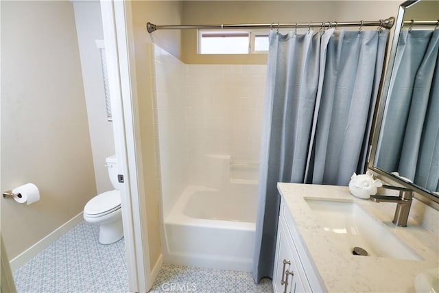 full bathroom featuring vanity, toilet, tile patterned flooring, and shower / bath combo with shower curtain