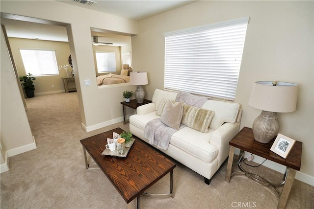 living room featuring light colored carpet