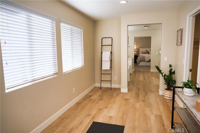 hallway featuring light hardwood / wood-style floors