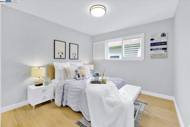 bedroom featuring hardwood / wood-style flooring