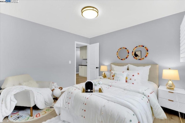 bedroom featuring hardwood / wood-style floors