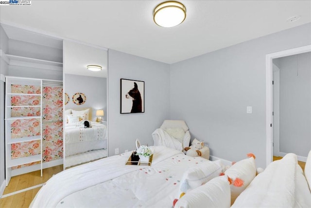 bedroom featuring hardwood / wood-style flooring