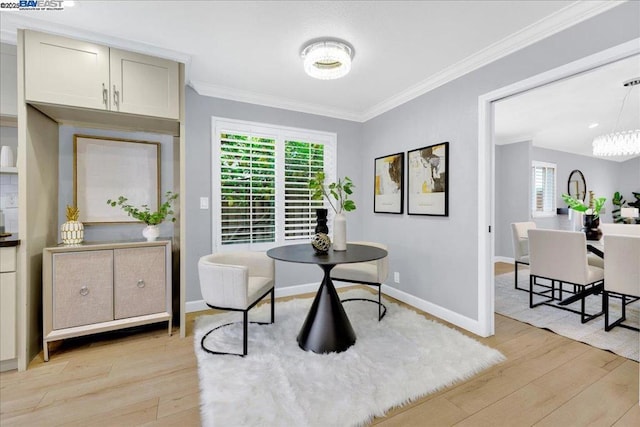 home office featuring ornamental molding and light wood-type flooring