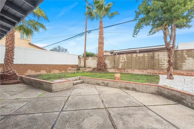 view of patio featuring a fenced backyard