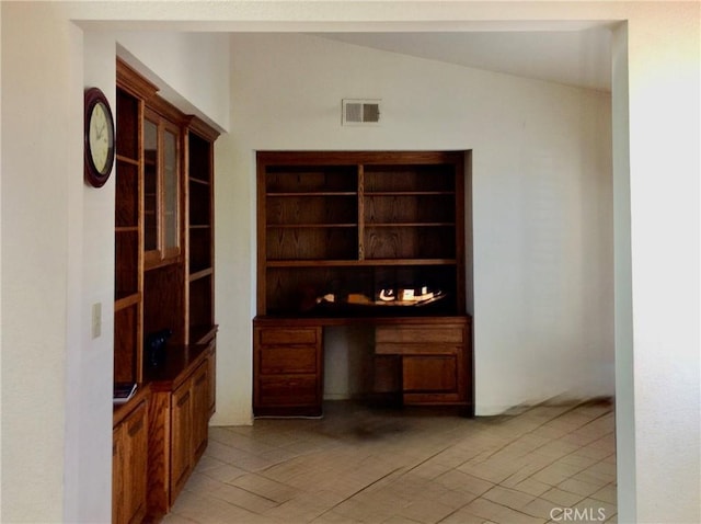 office area with lofted ceiling