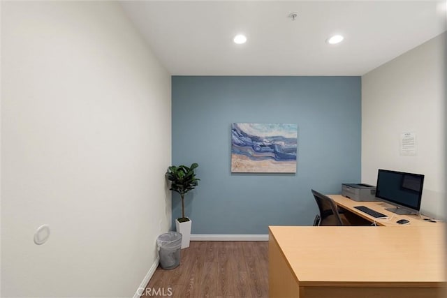 office with wood-type flooring