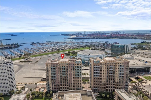 birds eye view of property featuring a water view