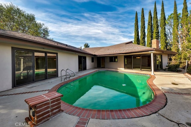 view of pool featuring a patio area