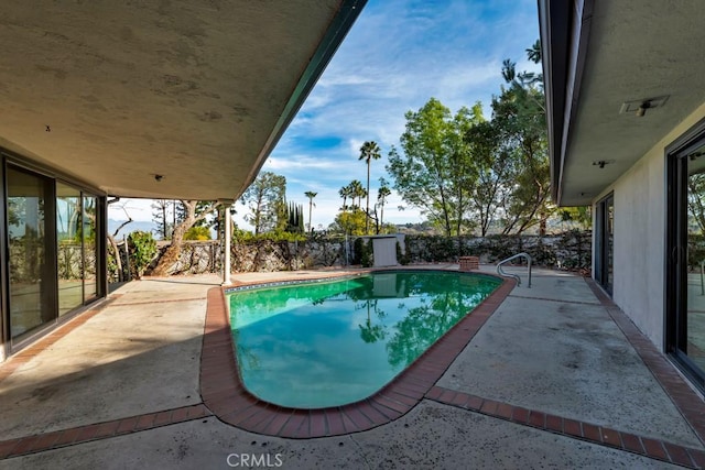 view of pool with a patio