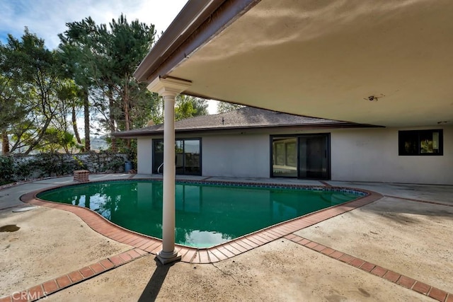 view of pool featuring a patio area