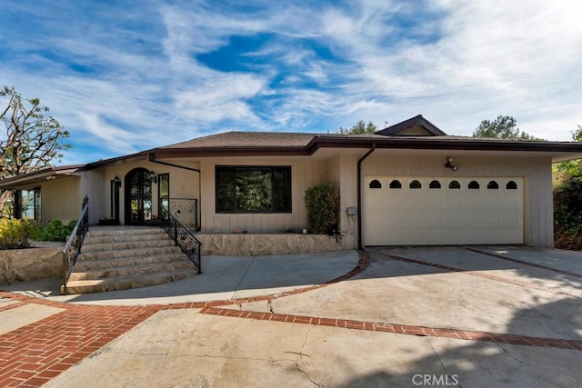 single story home featuring a garage