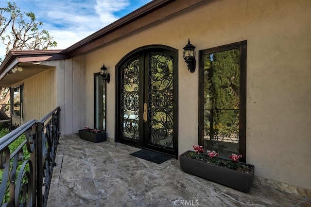 property entrance with french doors