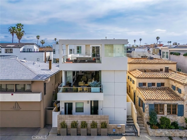 view of building exterior with a residential view