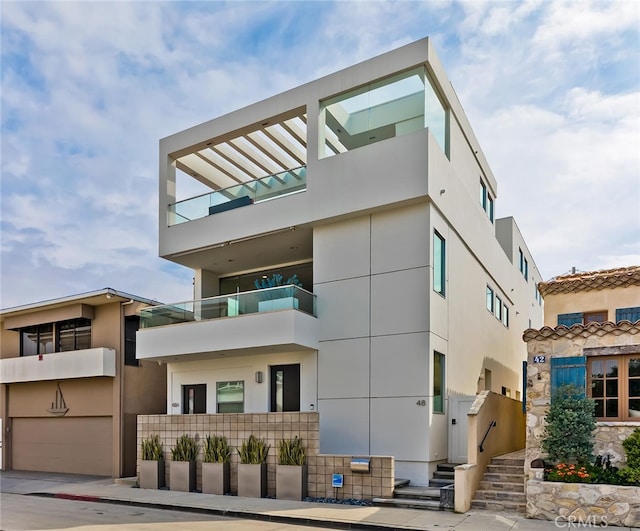 view of property featuring an attached garage