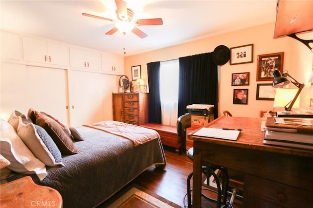 bedroom featuring dark wood-type flooring and ceiling fan