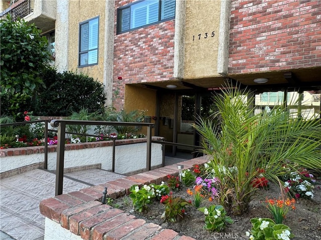 property entrance with a patio area