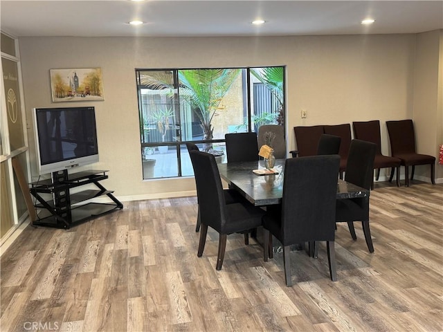 dining room with light wood-type flooring