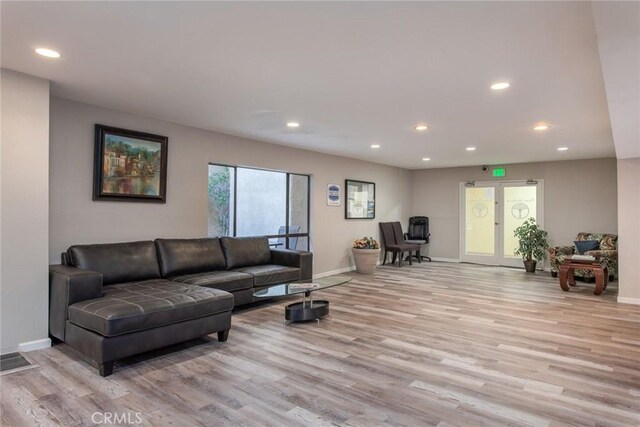 living room featuring light wood-type flooring