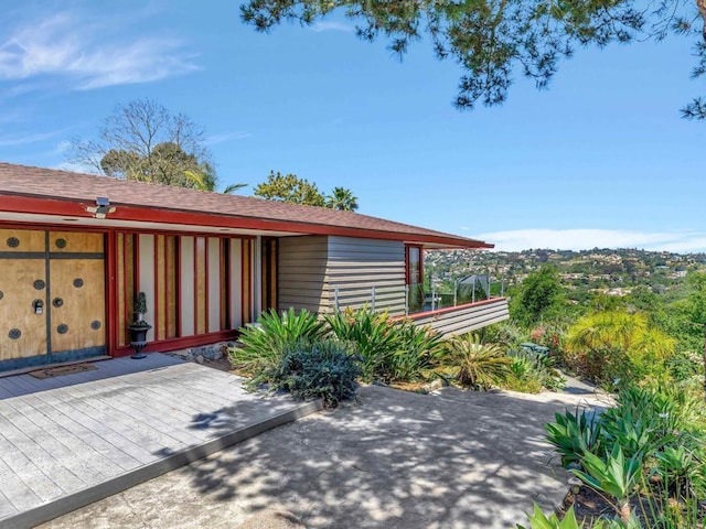 exterior space with a wooden deck