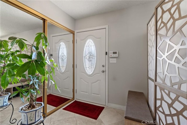 view of tiled foyer entrance