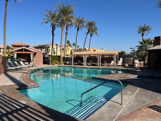 view of swimming pool featuring a patio area