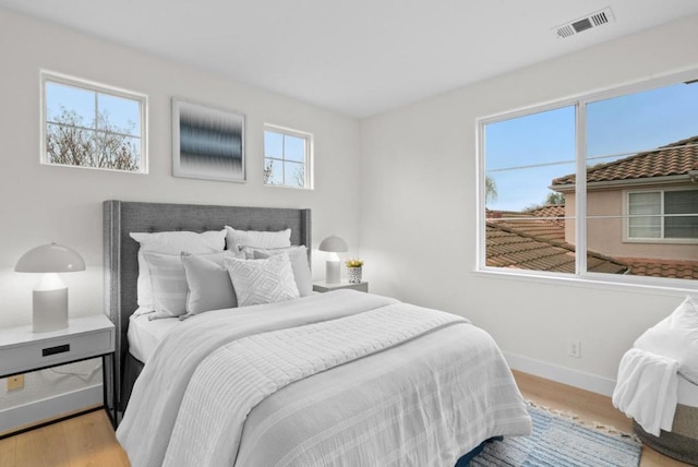 bedroom featuring light hardwood / wood-style flooring