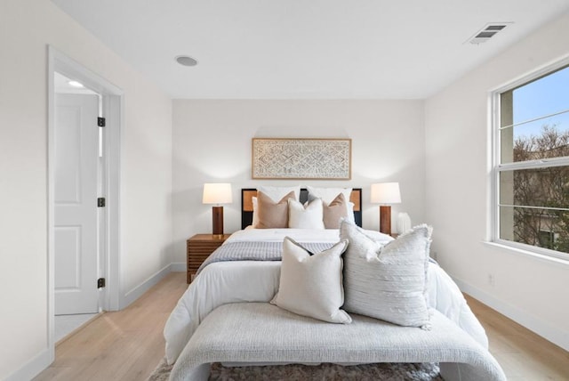 bedroom featuring light wood-type flooring