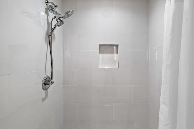 bathroom with a shower with shower curtain