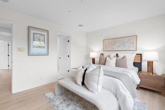 bedroom featuring light hardwood / wood-style flooring