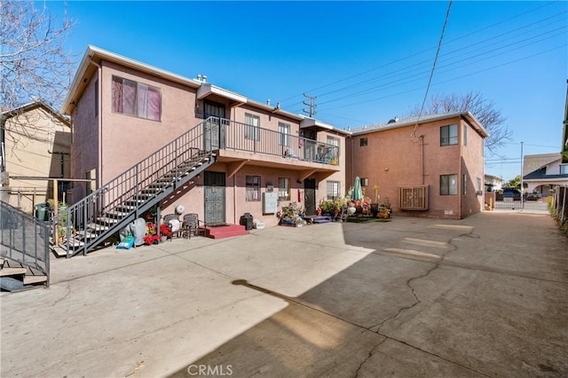 back of house featuring a patio area