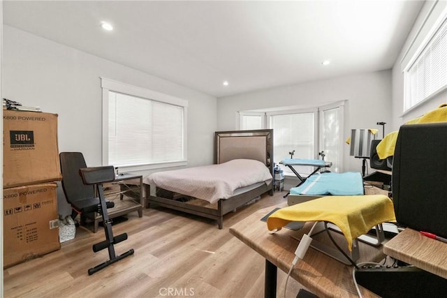 bedroom with light wood-type flooring