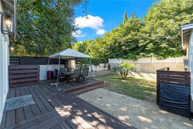 deck featuring a lawn