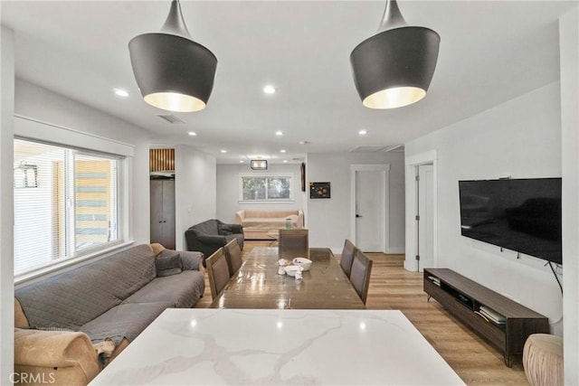 dining space featuring light hardwood / wood-style flooring