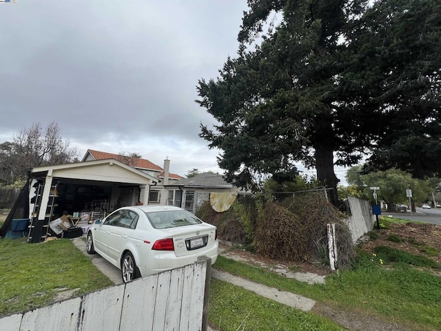 view of home's exterior featuring a yard