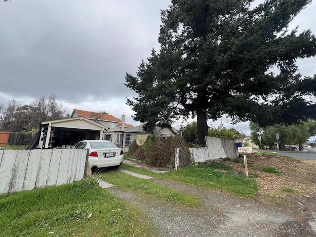 view of side of property featuring a garage