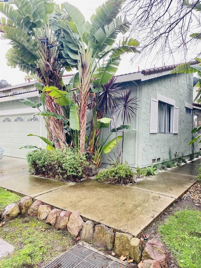 view of home's exterior featuring a garage