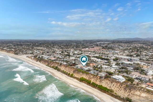 aerial view featuring a beach view and a water view