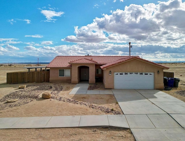 view of front of property with a garage