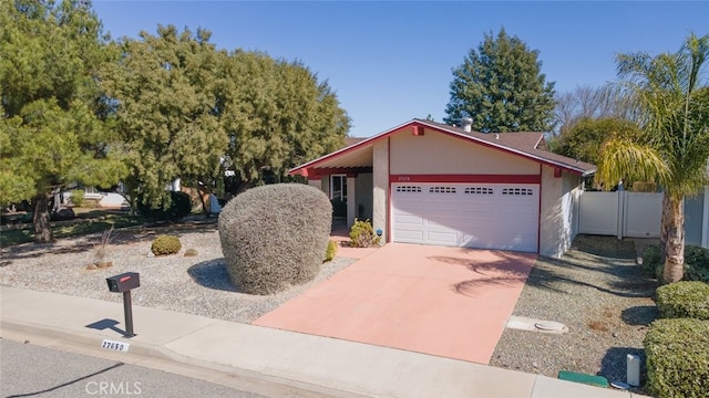 single story home featuring a garage