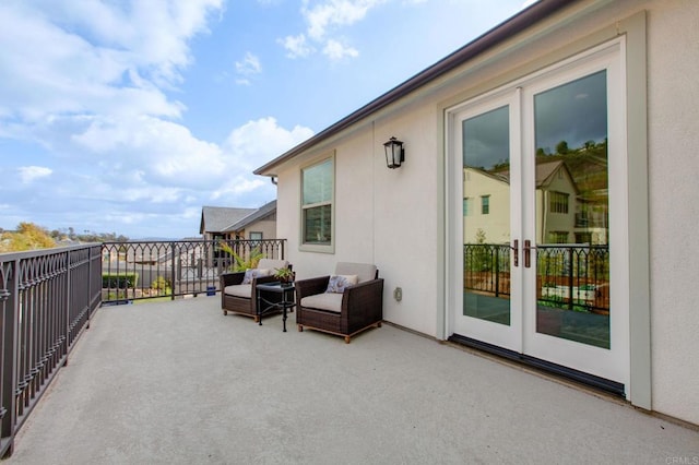 view of patio / terrace with a balcony