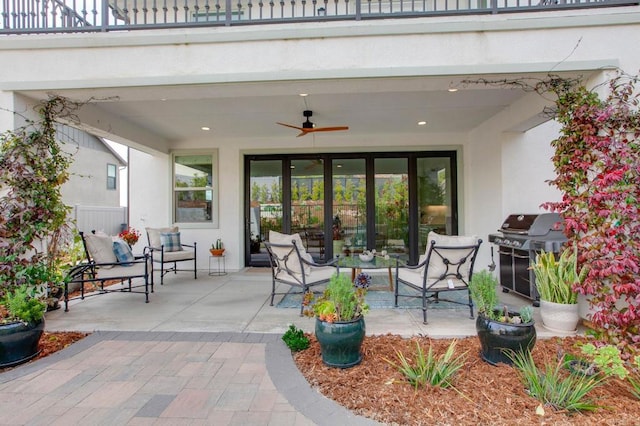 view of patio / terrace featuring ceiling fan, a balcony, and area for grilling